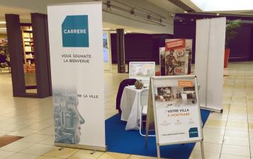 photo stand carrere dans galerie espace gramont a balma toulouse  pour presentation villas pastel a montrabe