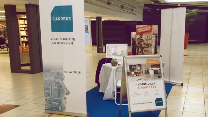 photo stand carrere dans galerie espace gramont a balma toulouse  pour presentation villas pastel a montrabe